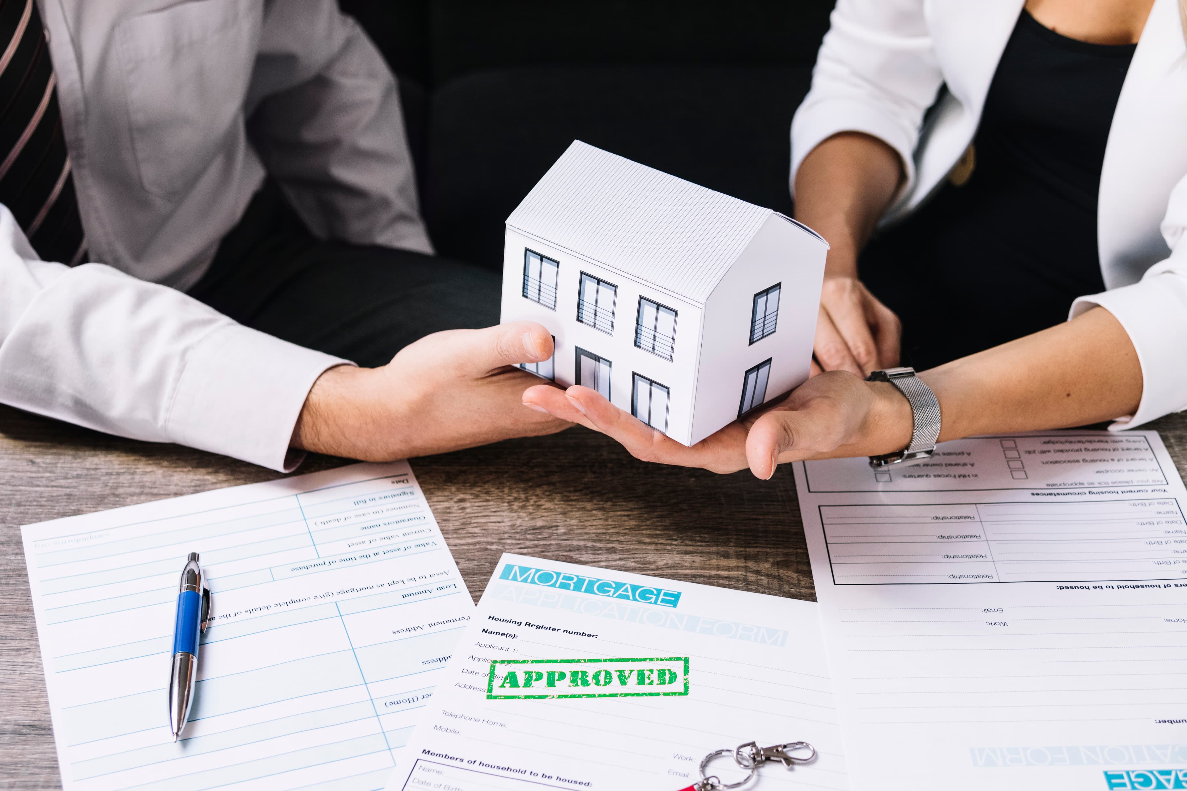 Handing Home with mortgage approval